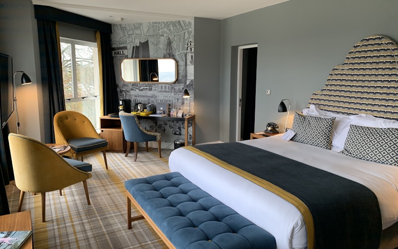 Families enjoying a newly built backyard deck with modern railing and furniture
