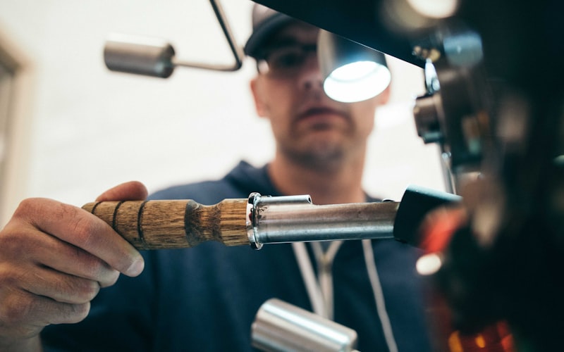 Safety goggles and gloves on workbench